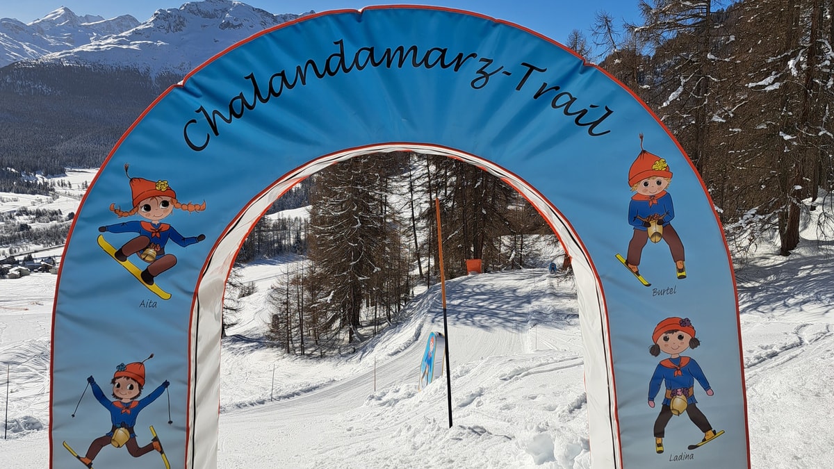 Survih – Samedan in Switzerland - a blue arch with cartoon characters on it.