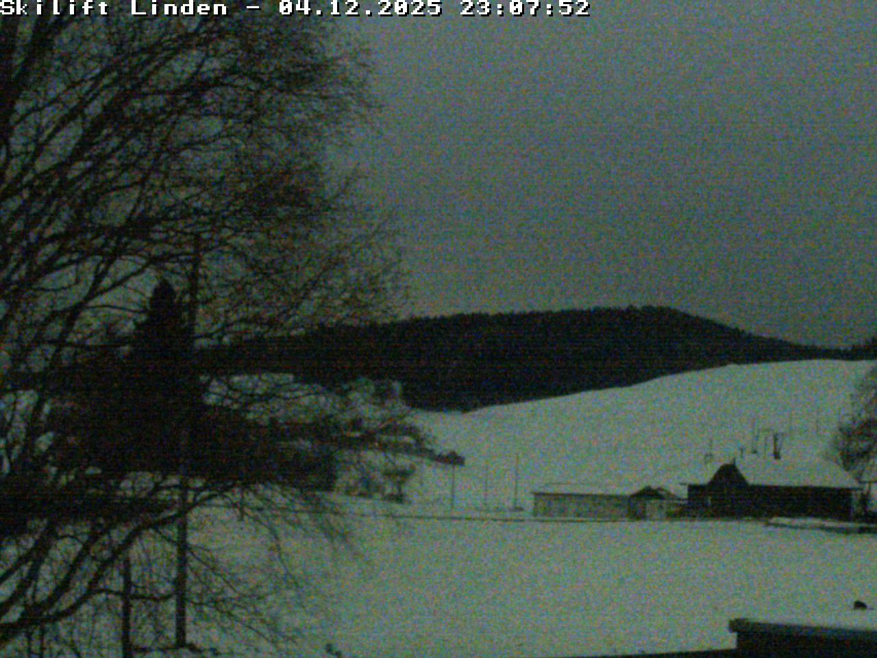 Linden – Schindelberg in Switzerland - a foggy view from the back yard of a house.
