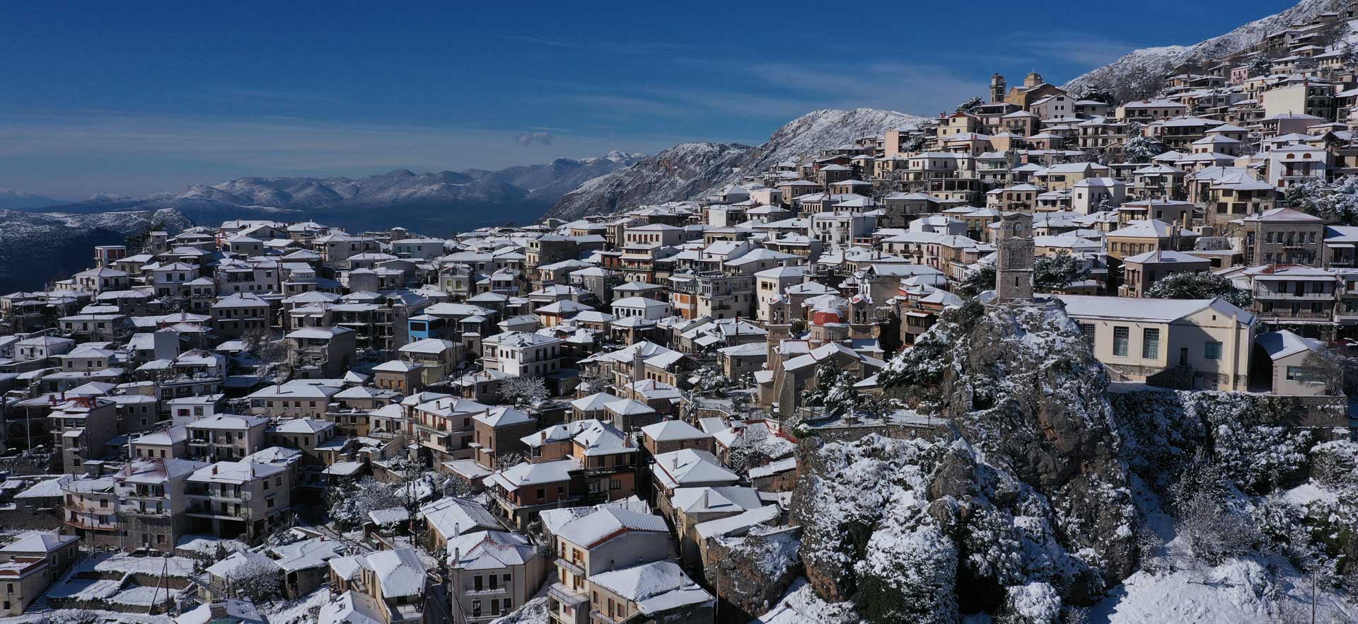 Mount Parnassos – Fterolakka | ​Kellaria in Greece - a snow covered village in the mountains.