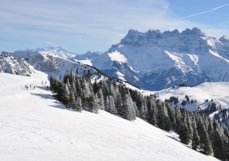 La Bonade – Grand Combe Chateleu in France - a snow covered mountain with trees and mountains in the background.