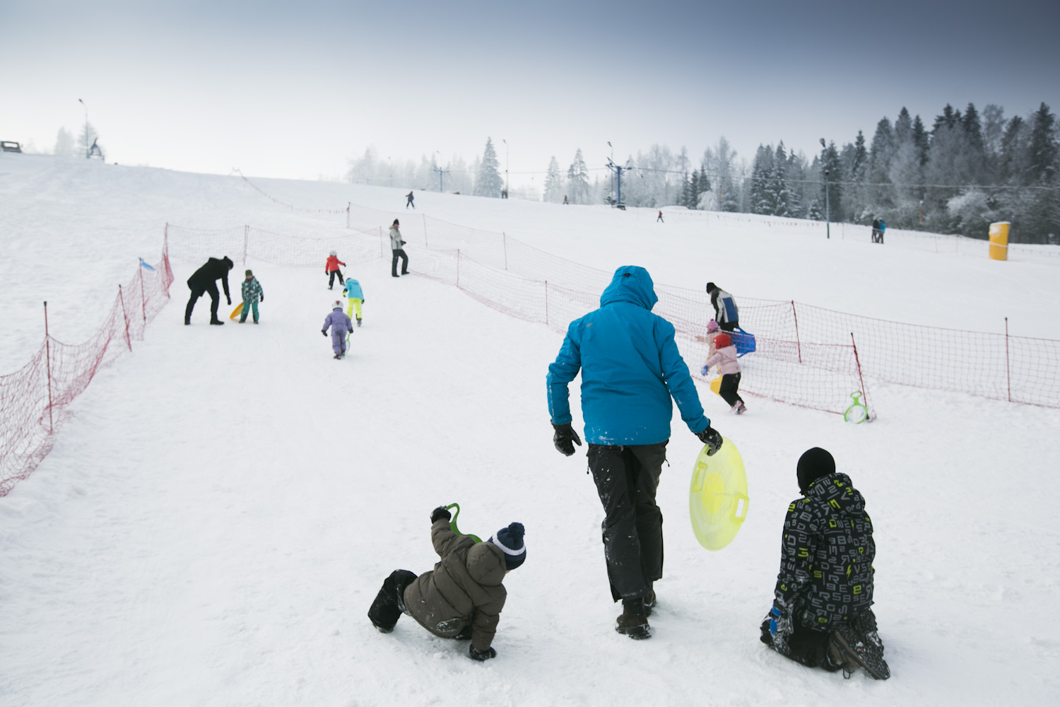 Zadział – Nowy Targ in Poland - a group of people playing in the snow.