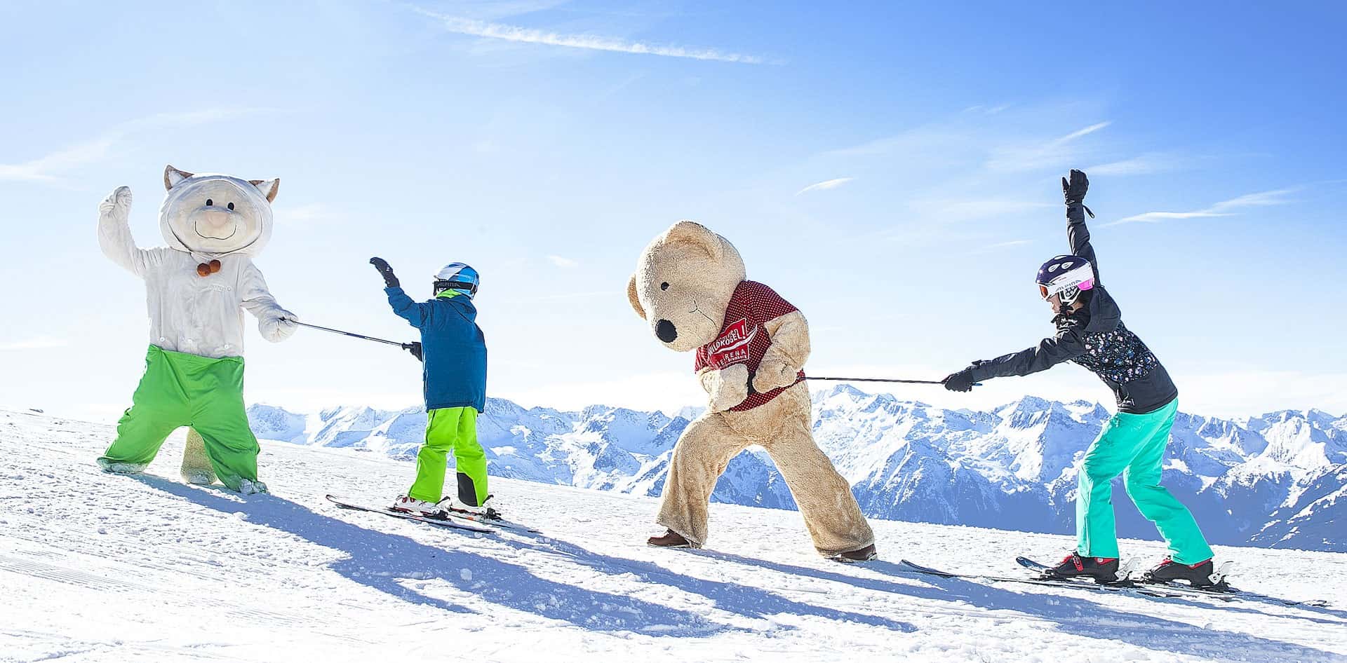 Wildkogel in Austria - a group of people skiing down a mountain.