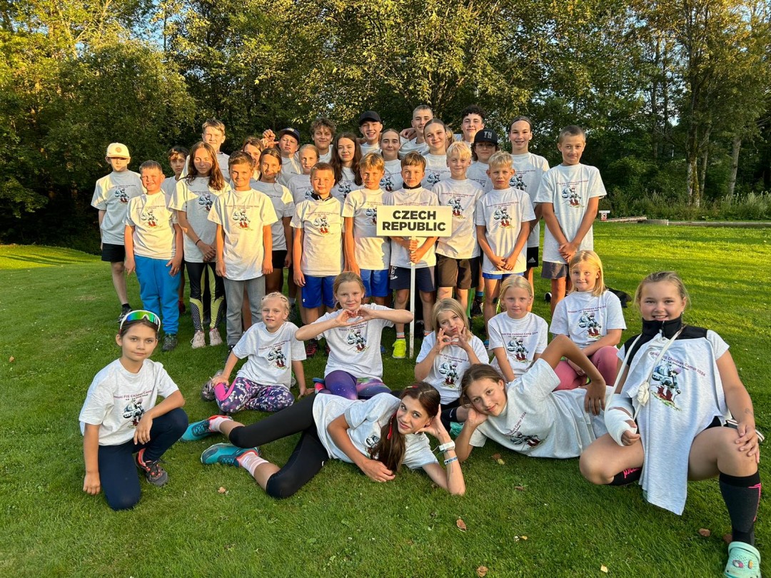Jezerné – Tabačka in Czech Republic - a group of children posing for a photo in the park.