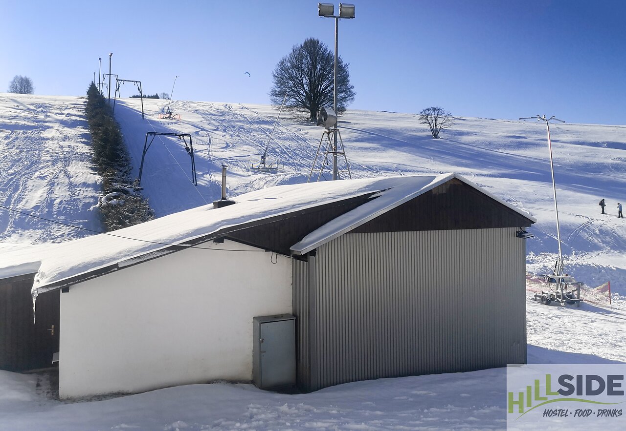 Gehrenlift – Bischofsgrün in Germany: a small building on the side of a snow covered mountain.