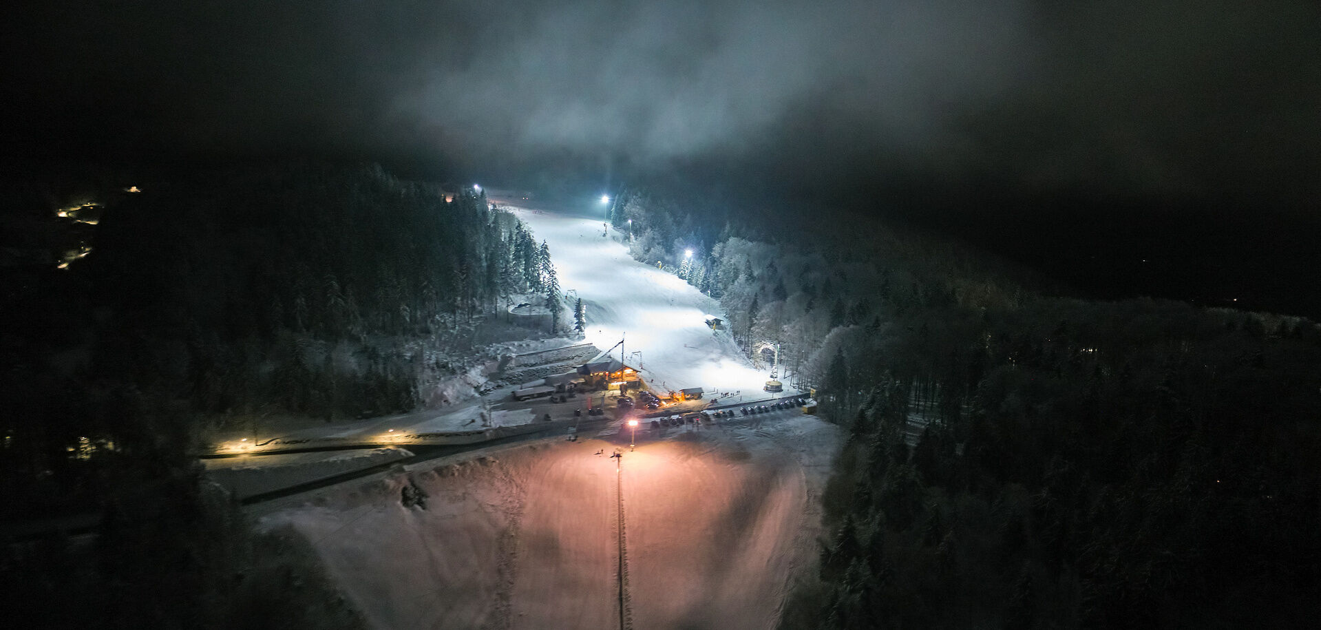 Steinberglift – Langfurth in Germany - a snow covered ski slope at night.