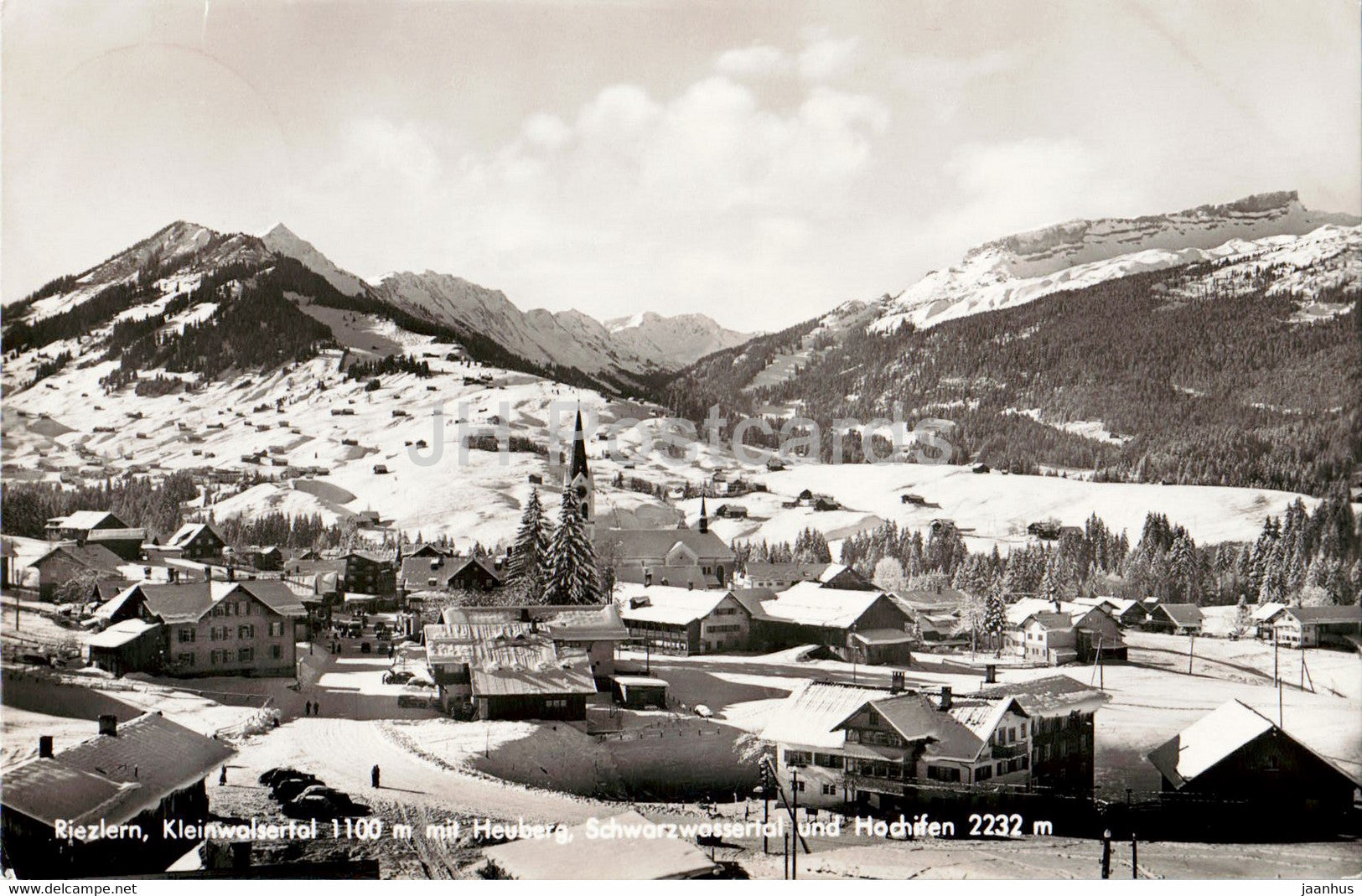Walmendingerhorn | Heuberg – Mittelberg | Hirschegg in Austria - a black and white photo of a town in the mountains.