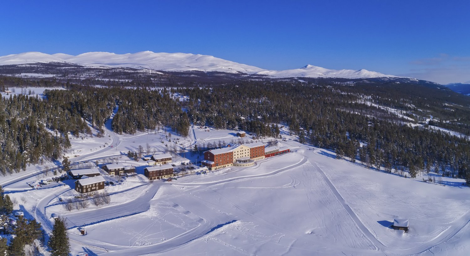 Dalseter – Espedalen in Norway: an aerial view of a ski resort in the mountains.