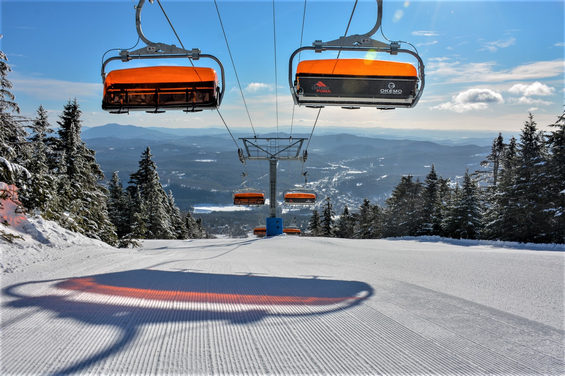 Okemo Mountain Resort in USA - a ski lift going up a snowy hill.