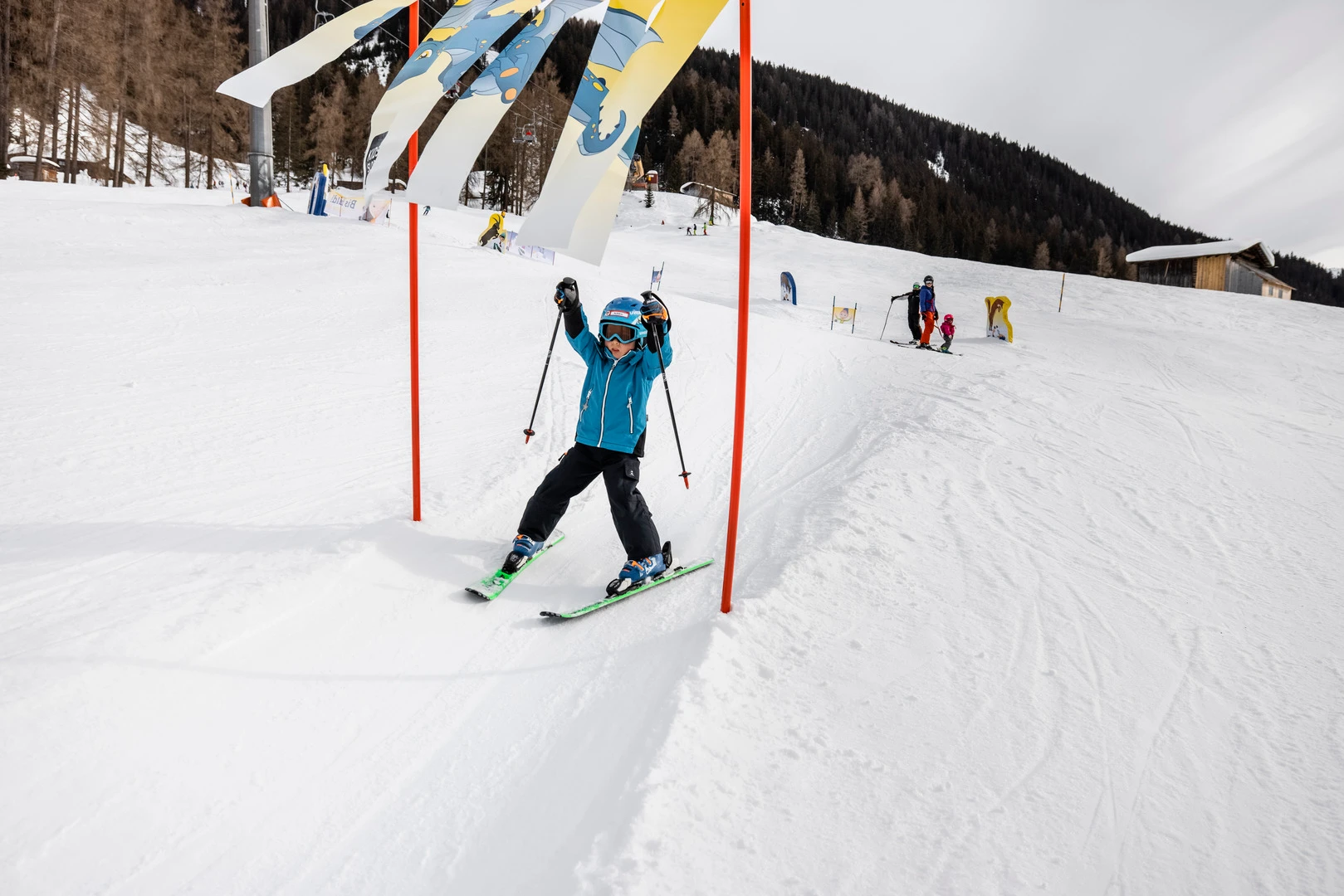 Bündalift – Davos in Switzerland - a person riding skis down a snowy slope.
