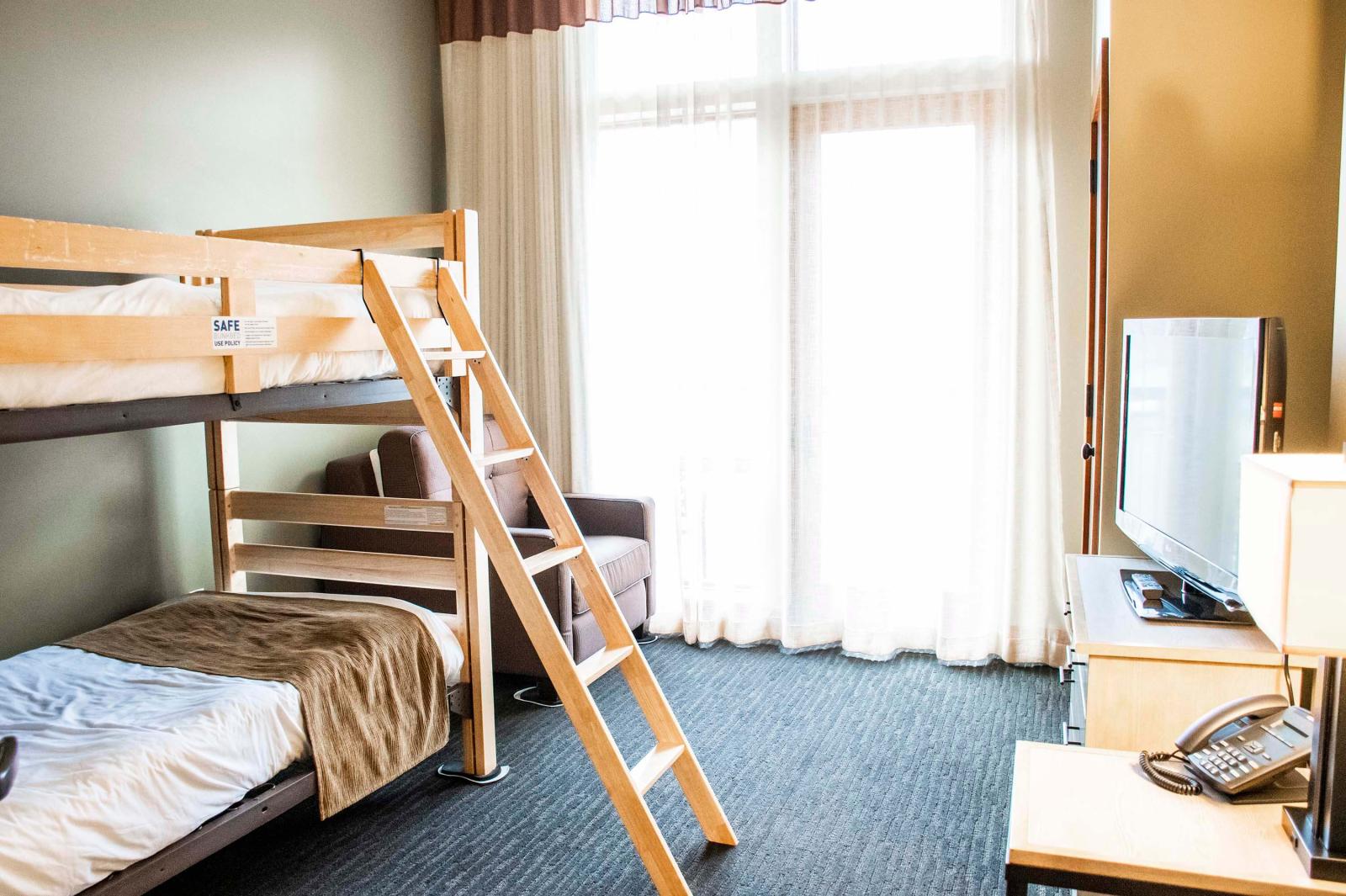 Jay Peak in USA - a room with bunks and a television.