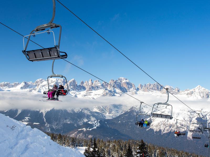 Paganella – Andalo in Italy - a ski lift going up the mountain.