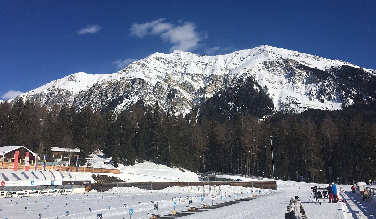 Lantsch | Lenz in Switzerland - a snow covered ski slope with a mountain in the background.