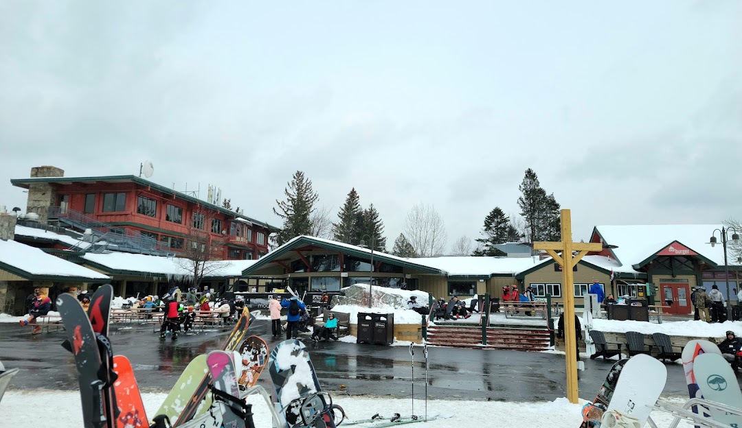 Mount Snow in USA - a group of people standing in the snow.