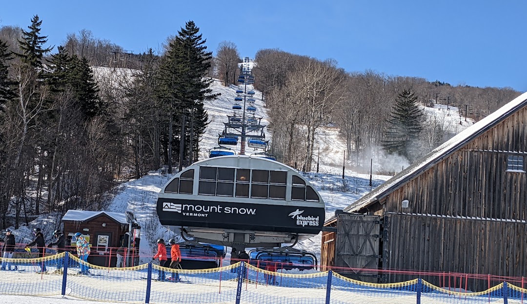Mount Snow in USA - a ski slope with a ski lift in the background.