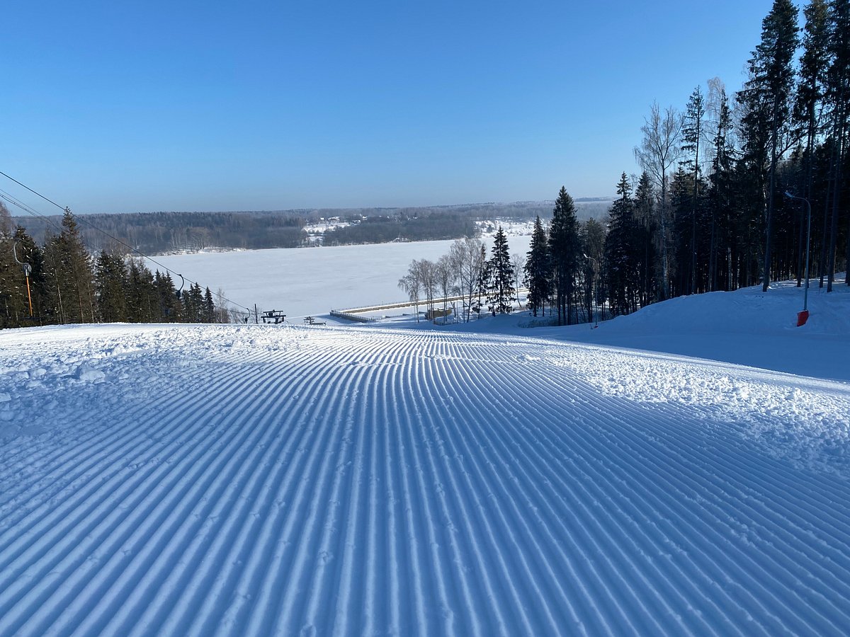 Milovka – Plios in Central Russia - a ski slope covered in snow with trees in the background.
