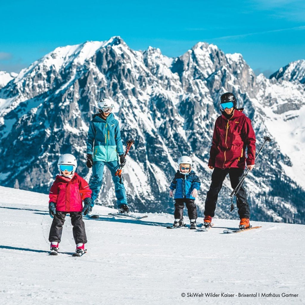 Muttereralm in Austria - a group of people standing on top of a mountain.