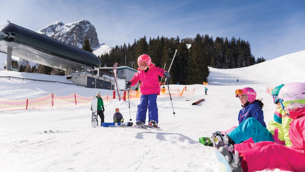 Muttereralm in Austria - a group of skiers on a ski slope.