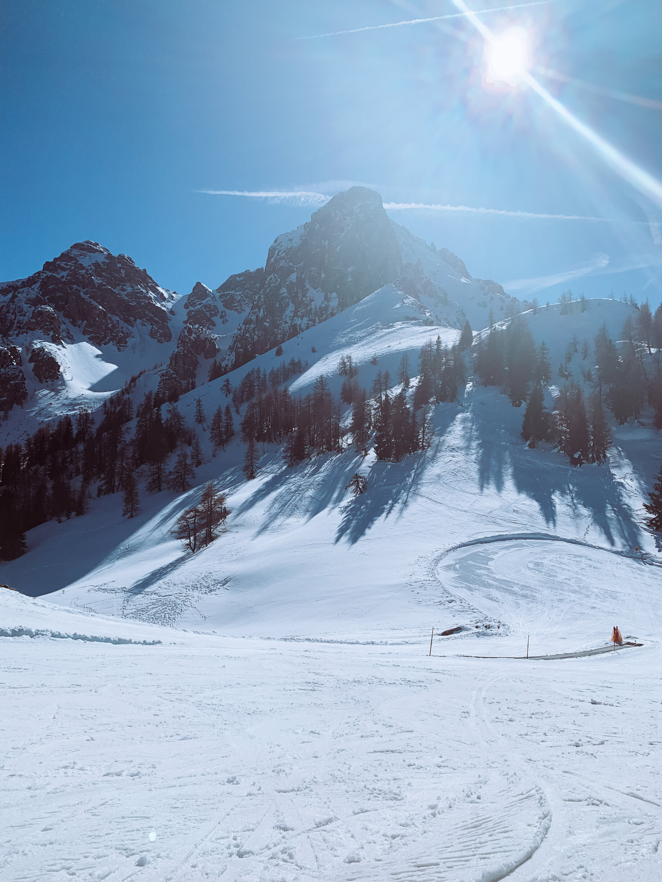 Muttereralm in Austria - a person skiing down a snow covered mountain.