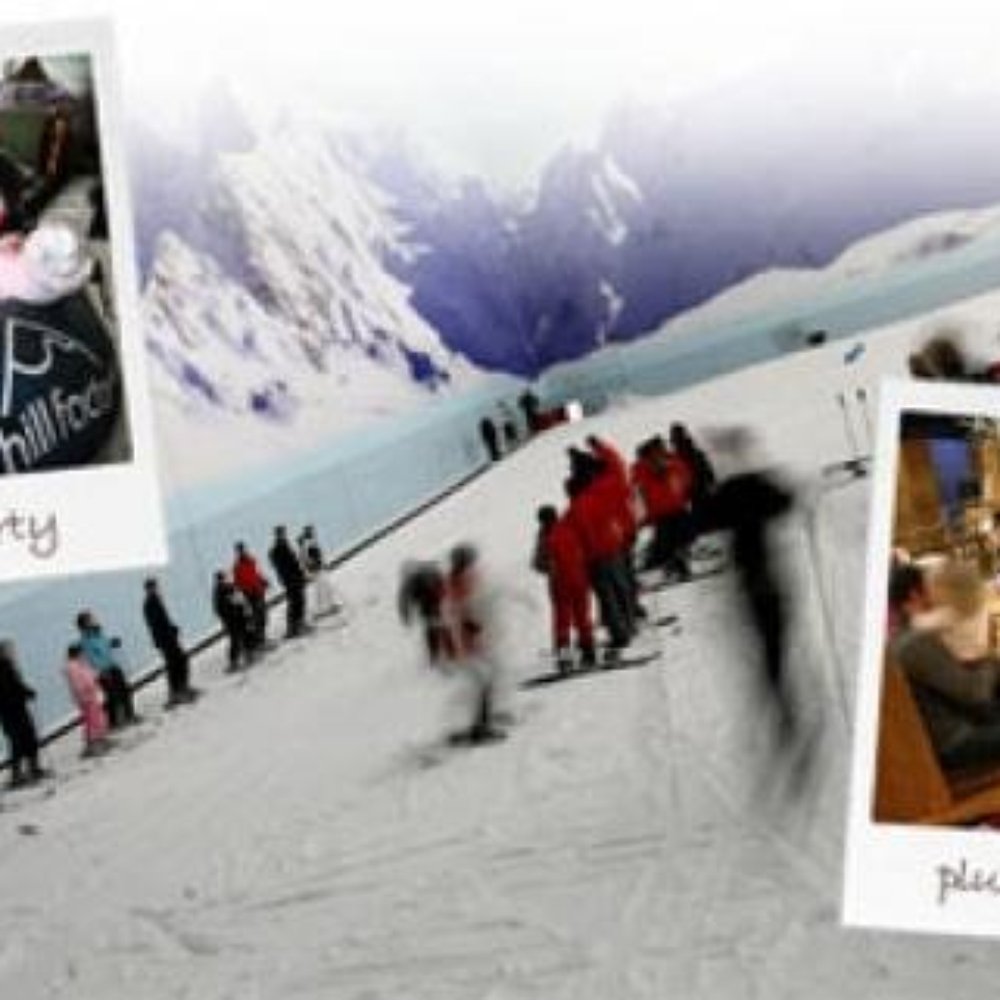 Stoke Ski Centre in United Kingdom - a group of people standing on top of a mountain.