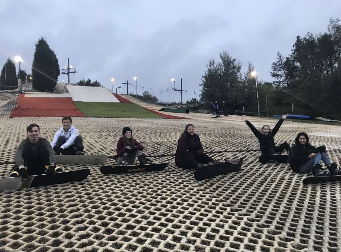 Stoke Ski Centre in United Kingdom - a group of people sitting on top of a roof.
