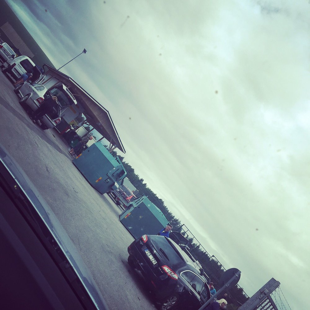 Rönnåsbacken in Sweden - a car parked on the side of the road.