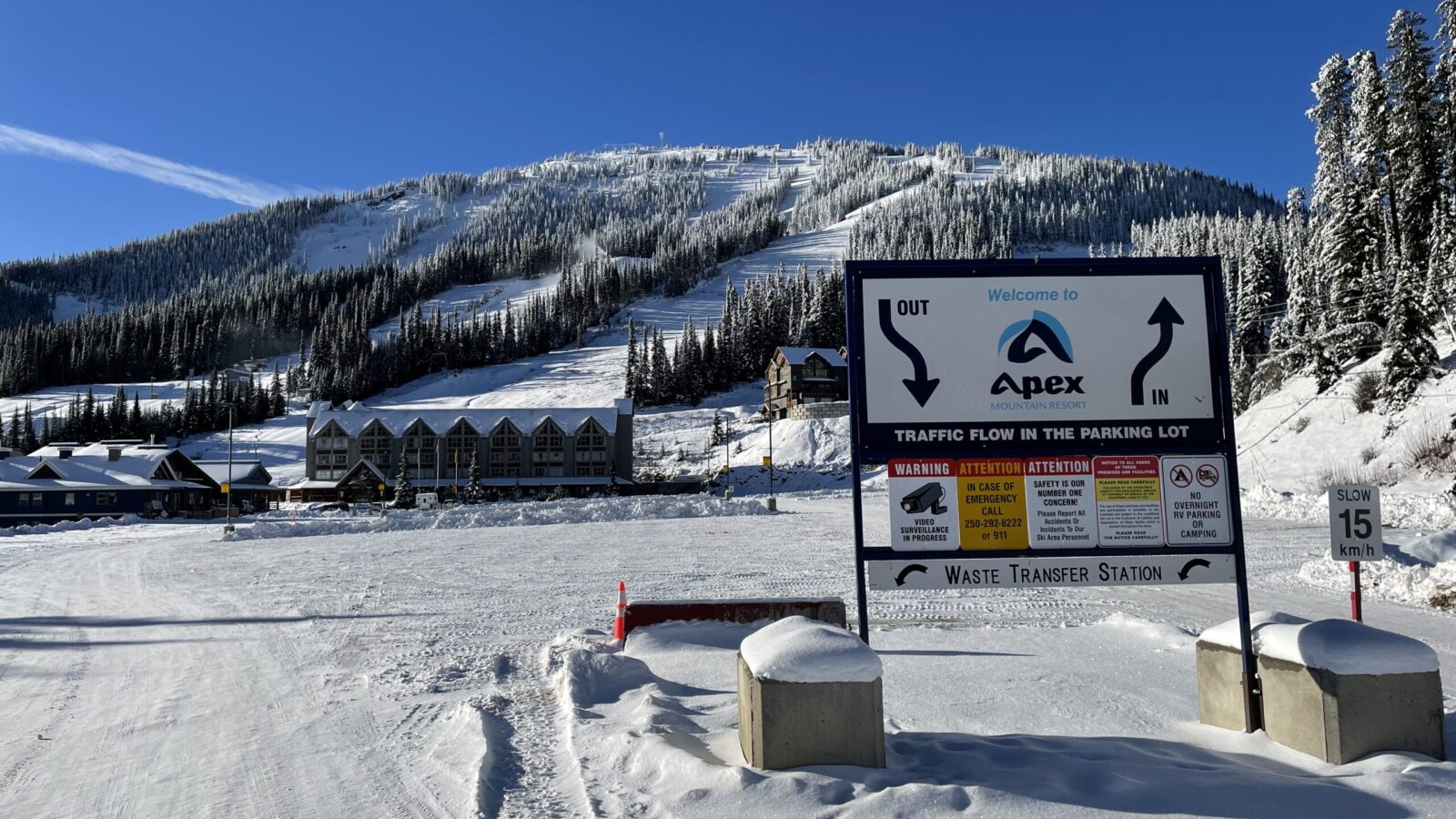 Apex Mountain Resort in Canada - a sign on the side of a snow covered mountain.