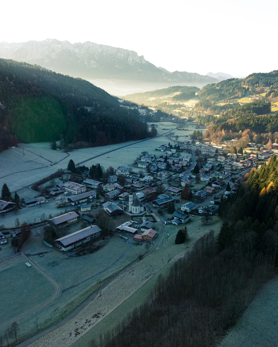 Sachrang in Germany - an aerial view of a small town in the mountains.