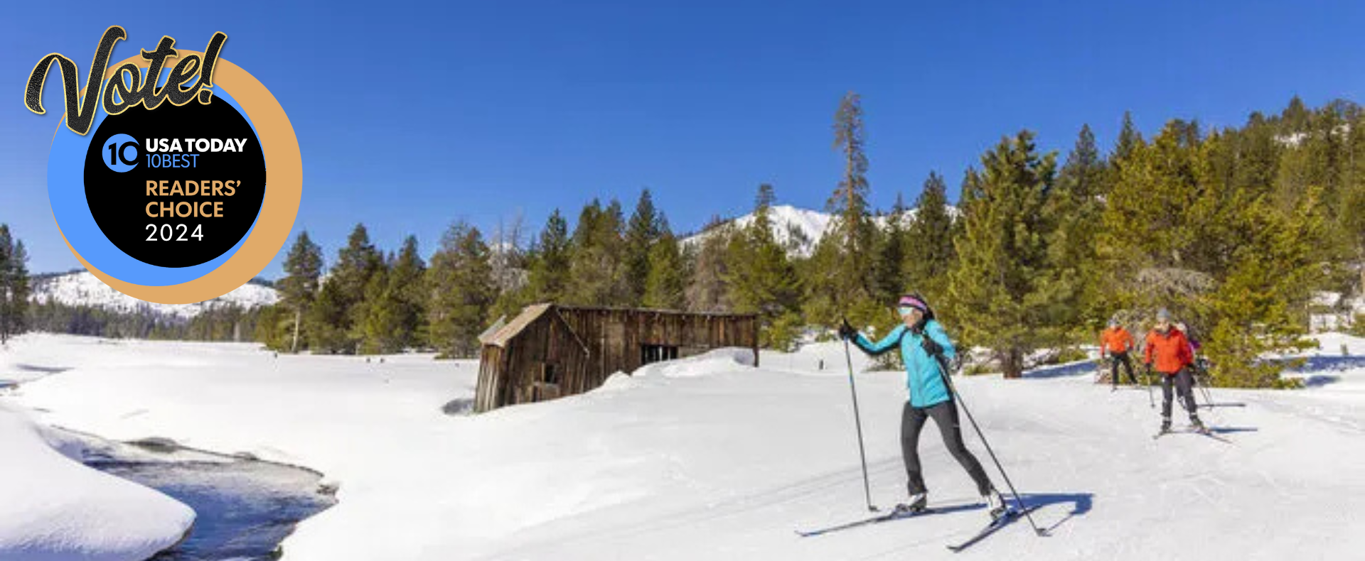Bear Valley in USA - a group of people skiing down a snowy slope.