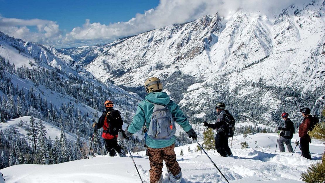 Bear Valley in USA - a group of people standing on top of a mountain.