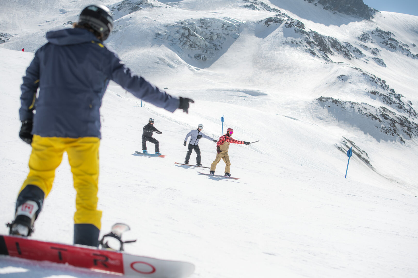 Sinswang in Germany - a group of people skiing down a snowy hill.