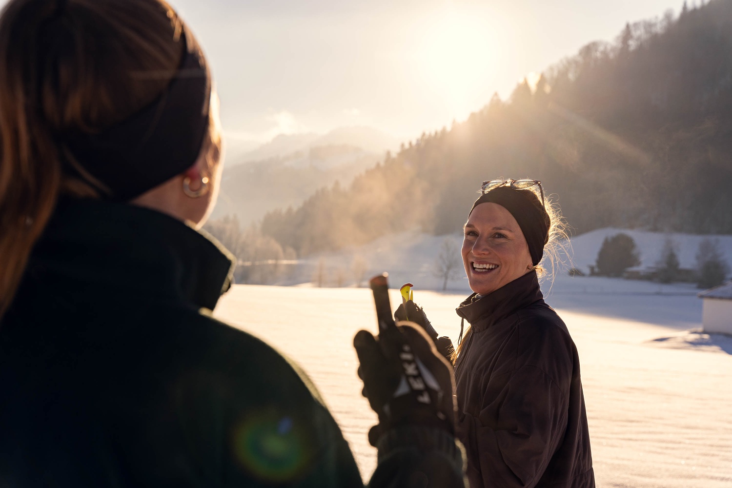 Sinswang in Germany - a woman standing on a snow covered field.