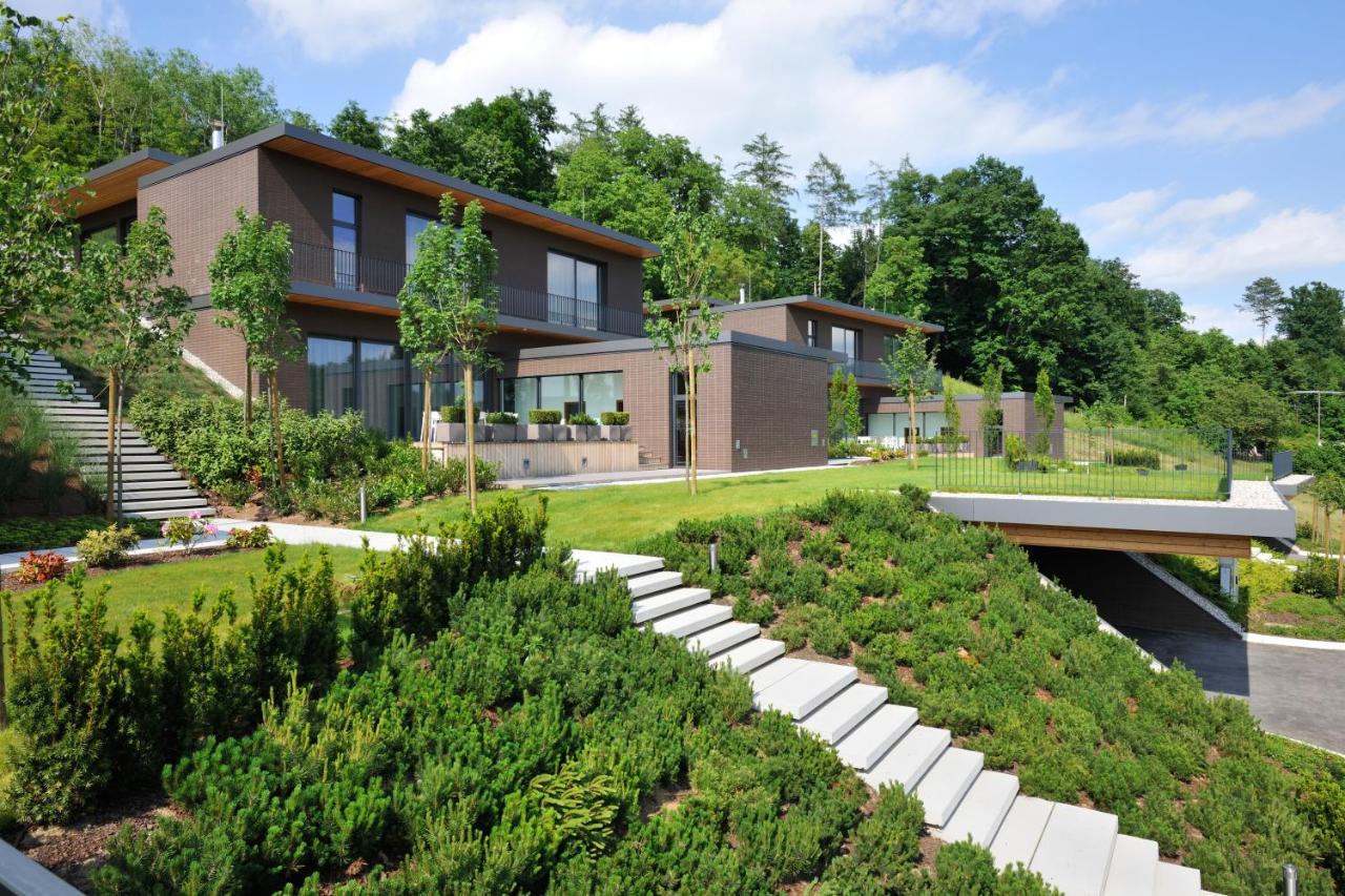 Janina – Rogaška Slatina in Slovenia - a house with a green roof and stairs.