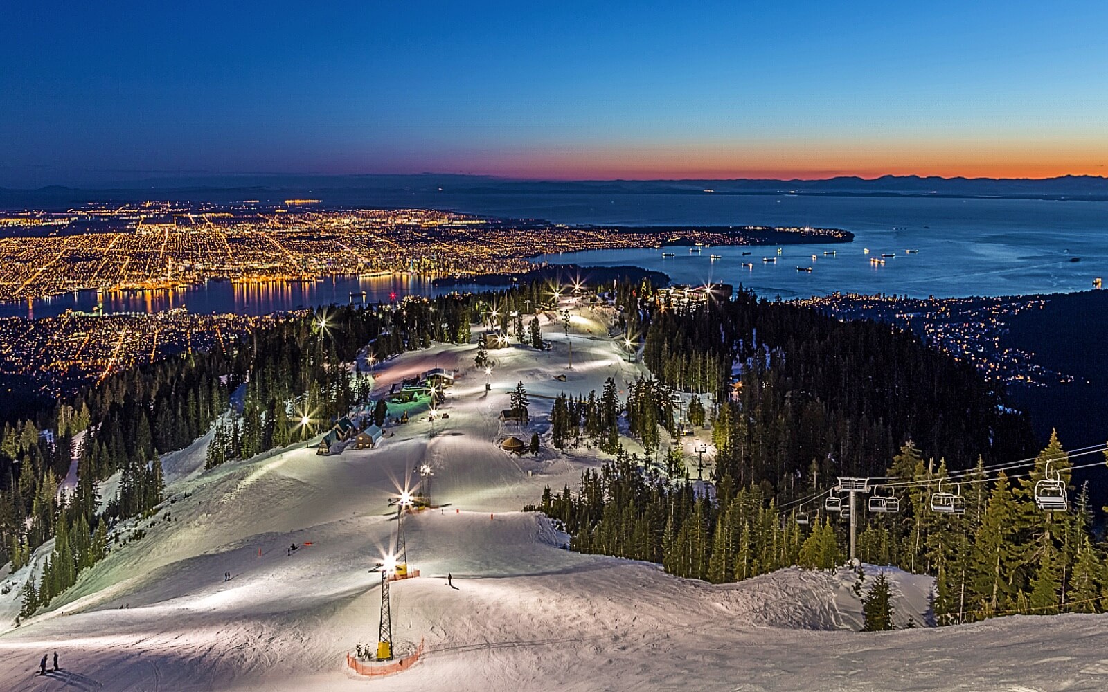 Grouse Mountain in Canada - the view from the top of whistle mountain at night.