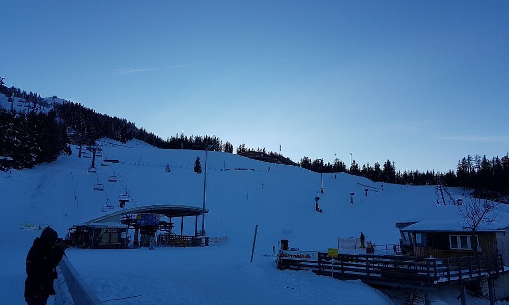 Arena Bergeralm in Austria - a person standing on a snow covered ski slope.