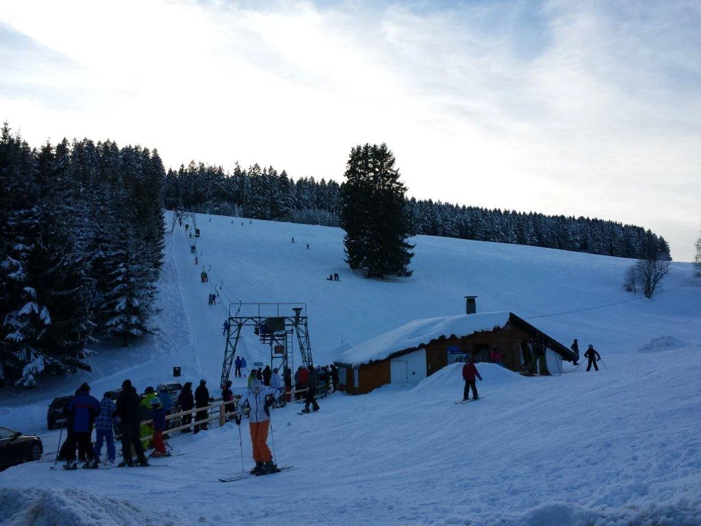 Schlossberg – Oberkirnach in Germany - a group of people skiing down a snow covered slope.