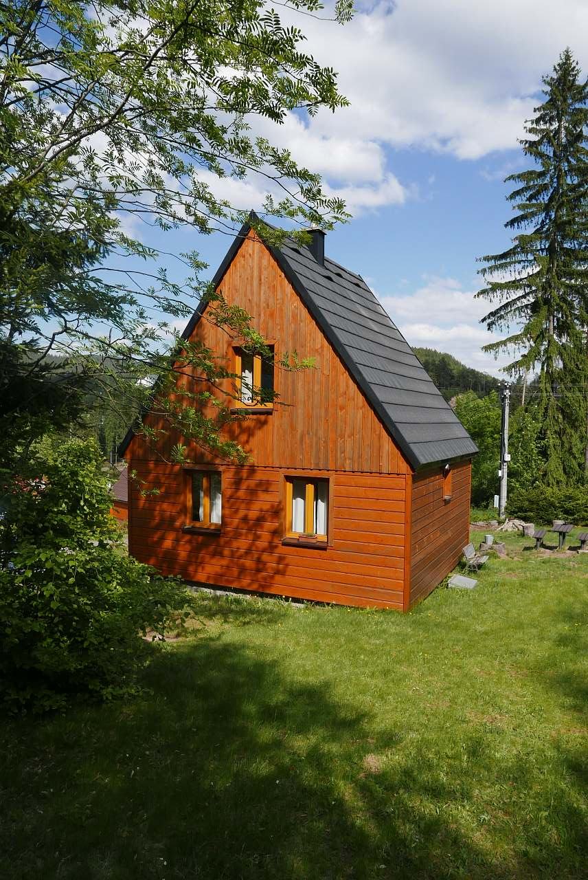 Radegast Sihly na Krásné in Czech Republic - a small wooden house in the woods.