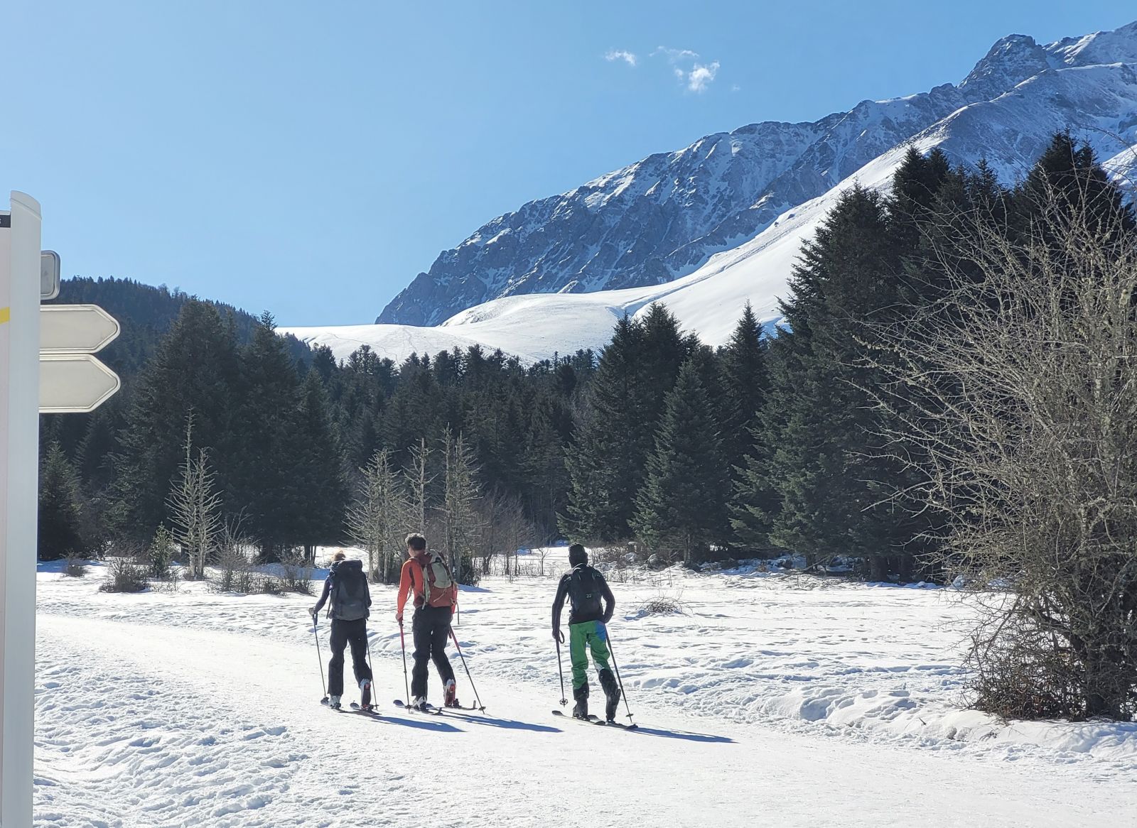 Val d'Azun in France - two people cross country skiing in the mountains.