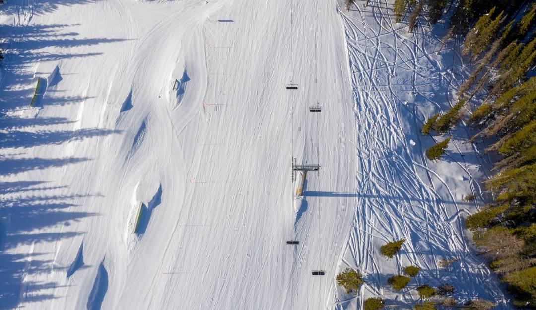 49° North Mountain Resort in USA - an aerial view of a snow covered ski slope.