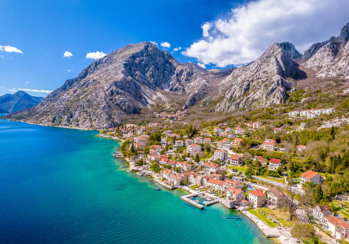 Ivanova Korita in Montenegro - an aerial view of a small town by the sea.