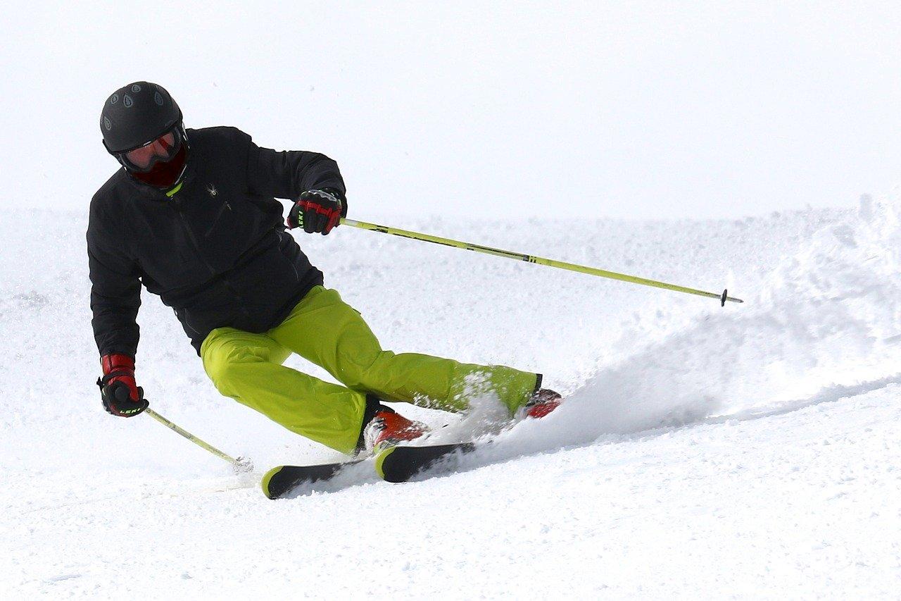 Knoten – Oberrod in Germany - a man riding skis down a snow covered slope.