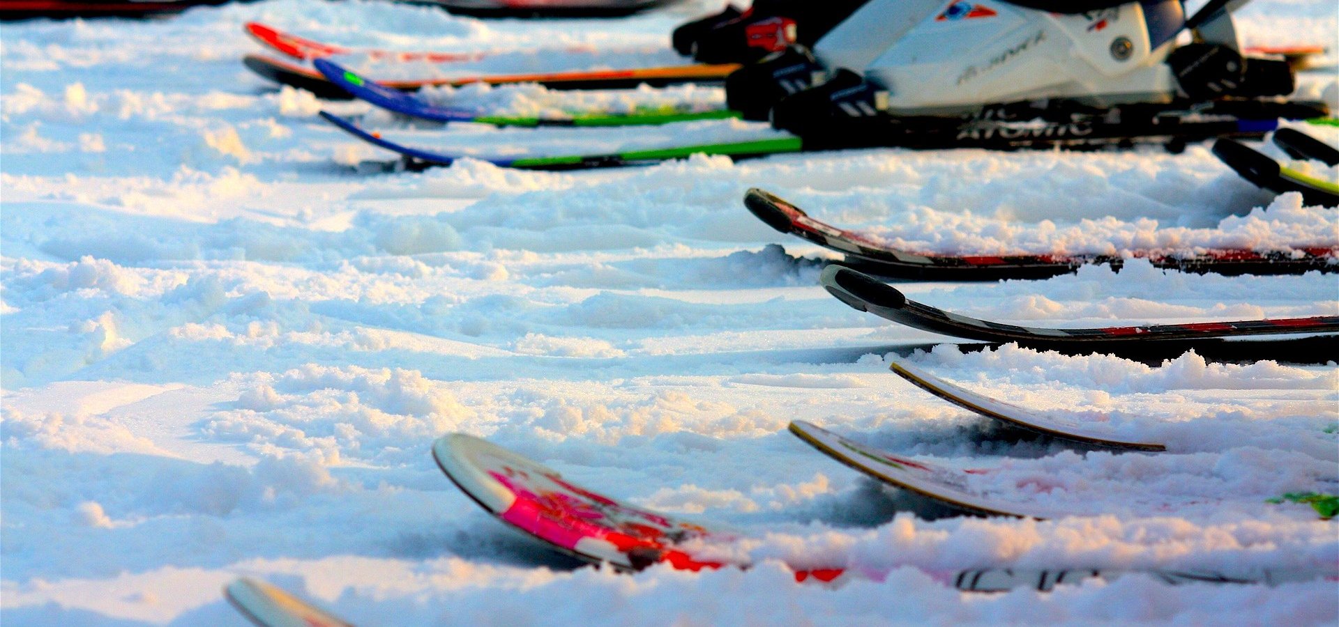 Przy Kolibie in Poland - a group of snowmobiles sitting in the snow.
