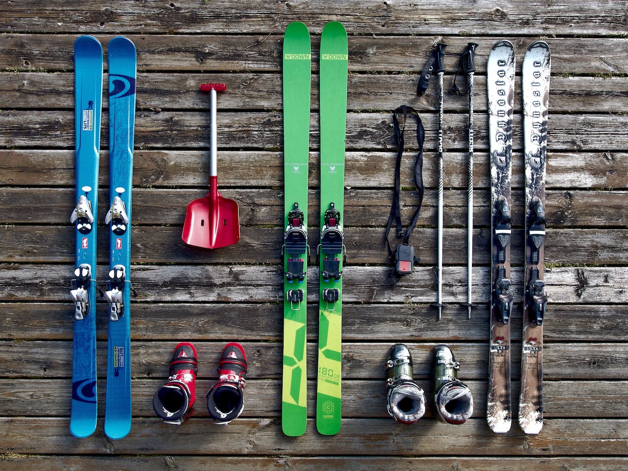 Monte Voggo – Voggenthal in Germany - a bunch of skis and ski poles on a wooden floor.