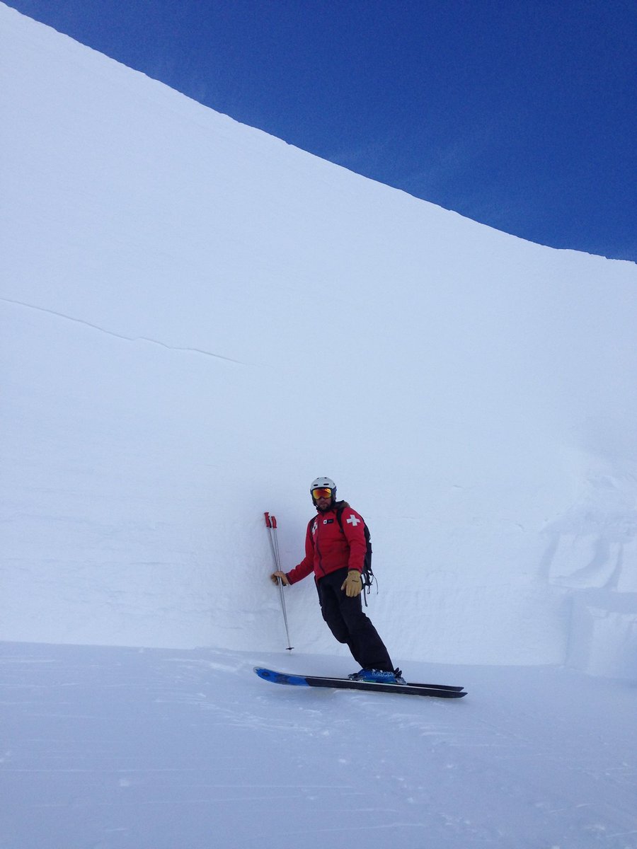 Kirkwood in USA - a person in a red jacket skiing down a hill.