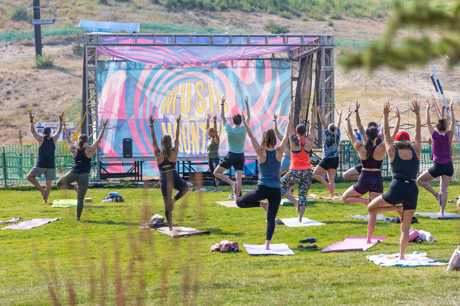 Bogus Basin in USA - a group of people doing yoga in a field.