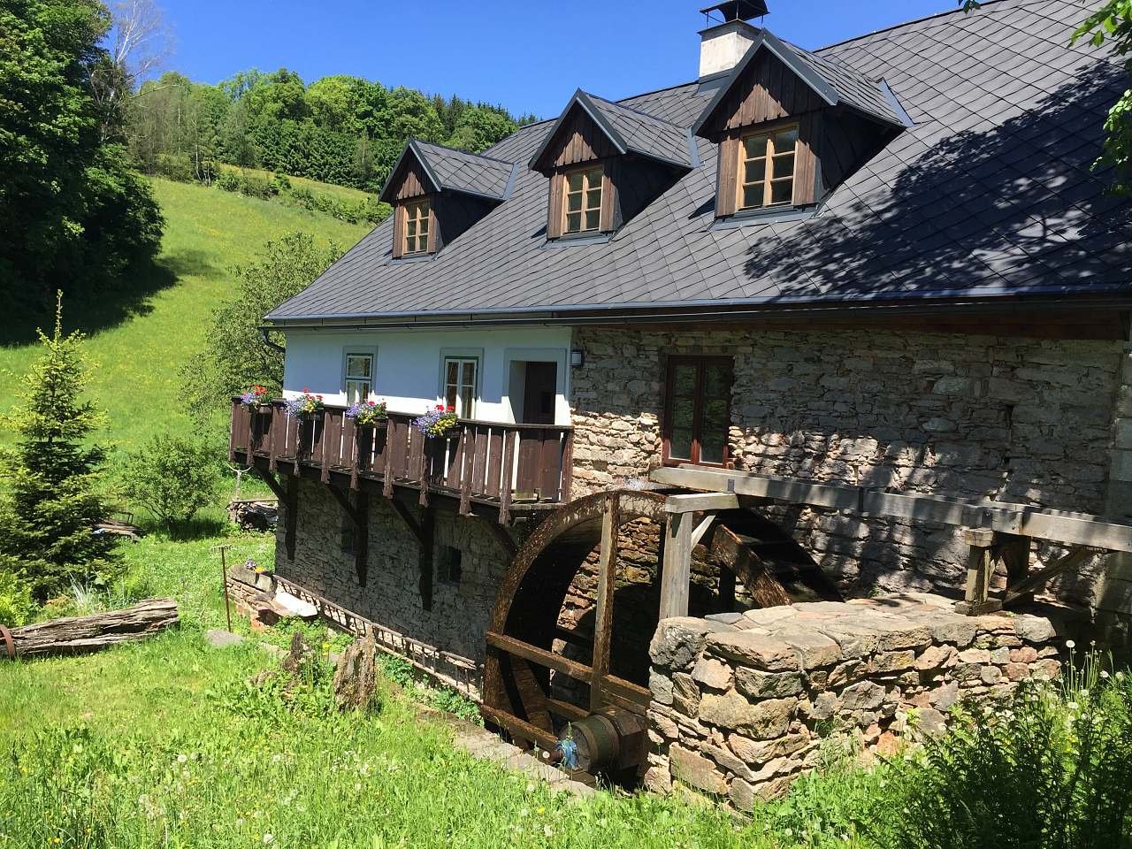 Šerlišský mlýn – Deštné v Orlických horách in Czech Republic - a stone house in the mountains.