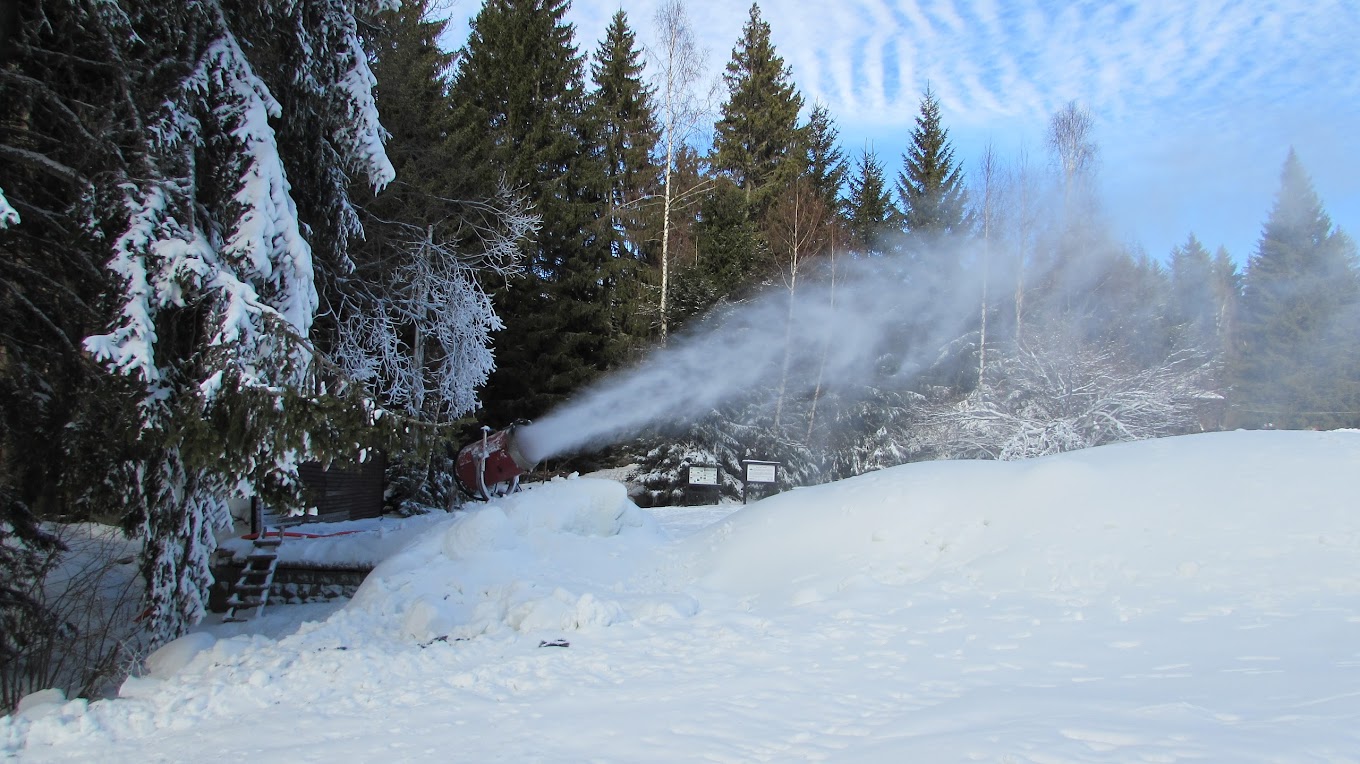 Ophelii in Bulgaria - a truck is driving through the snow covered forest.