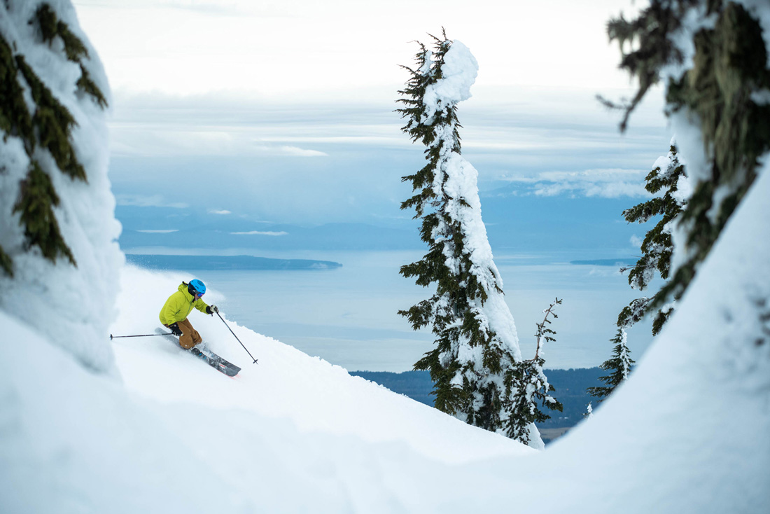 Mt Washington, Vancouver Island, Canada skier going down the slopes