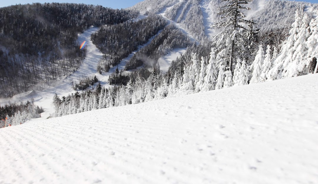 Gore Mountain in USA - a person skiing down the side of a mountain.