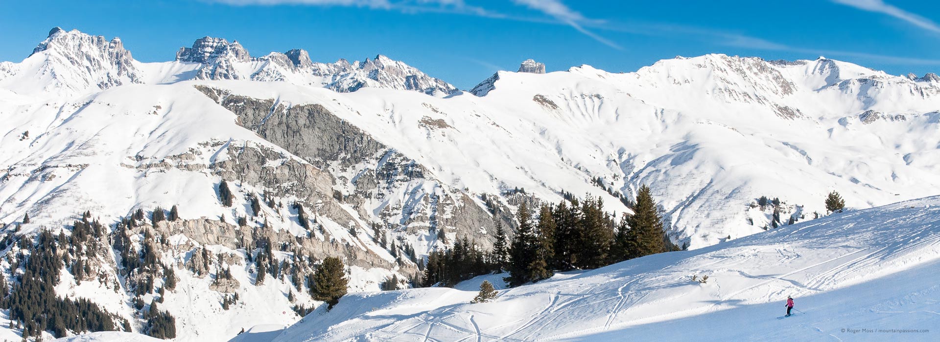 Arêches in France - a person skiing down the side of a mountain.