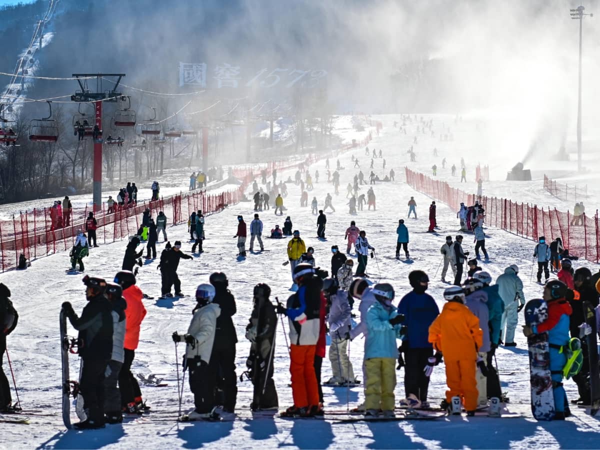 Beidahu Jilin in China - a group of people standing on a ski slope.